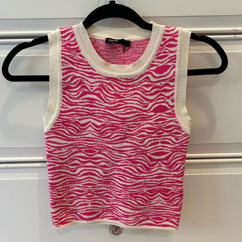 Pink and white knit zebra print top